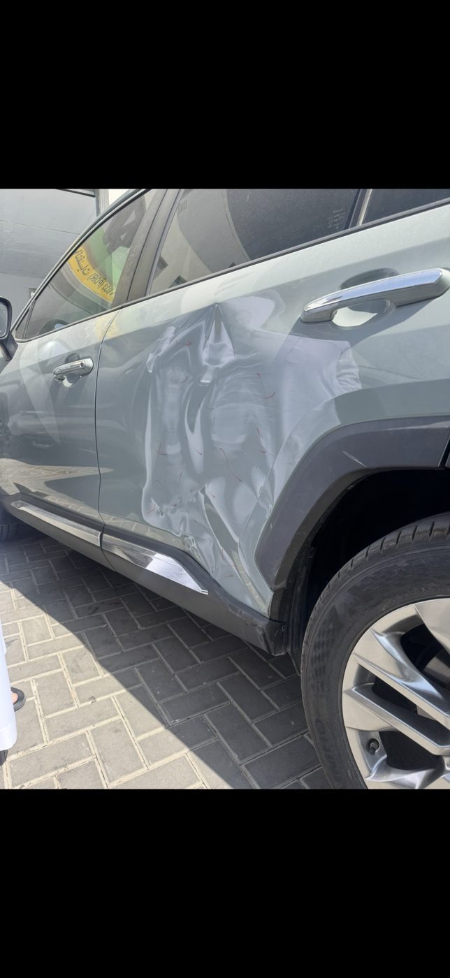 قبل الإصلاح — انبعاج على الباب